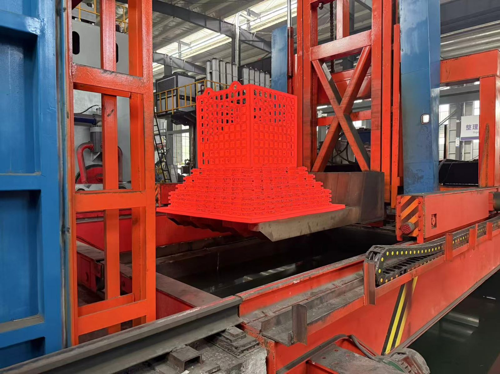 Quench basket lowered into the cooling medium after heat treatment